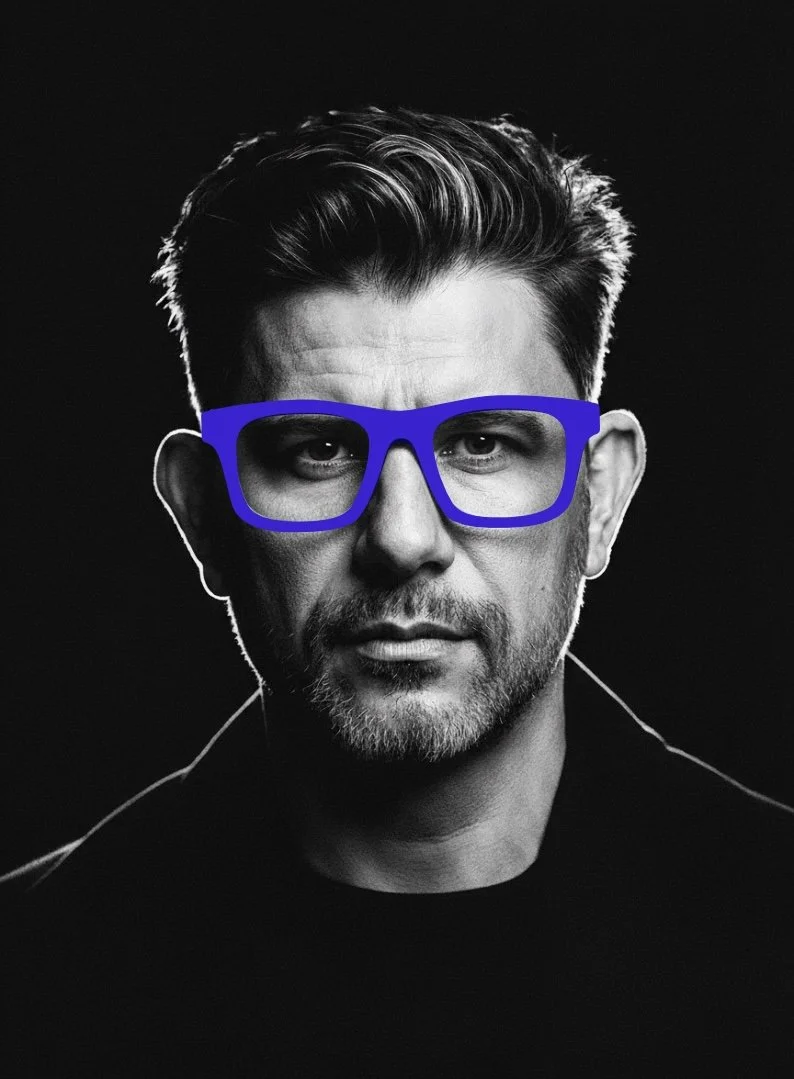 Portrait of Samy Halim, French-Algerian pop art artist, wearing blue glasses